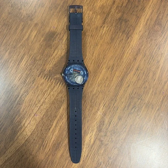 Navy Swatch Watch with navy circle sparkle on watch face. - Picture 2 of 4
